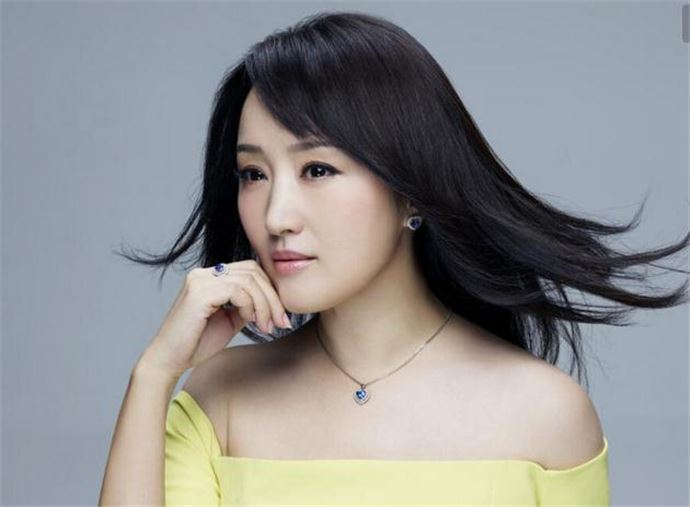 杨钰莹退出歌坛的原因 杨钰莹赖文峰的爱情