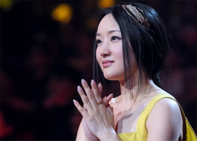 杨钰莹退出歌坛的原因 杨钰莹赖文峰的爱情