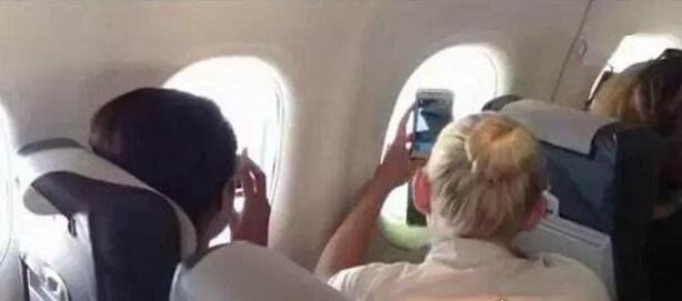 飞机上拍到神仙救人 专家称神仙图片并非伪造(附视频)