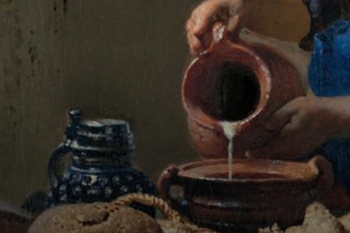 倒牛奶的女仆油画赏析