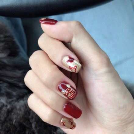 2022新年发财美甲图片大全 2022春节发财暴富美甲图片