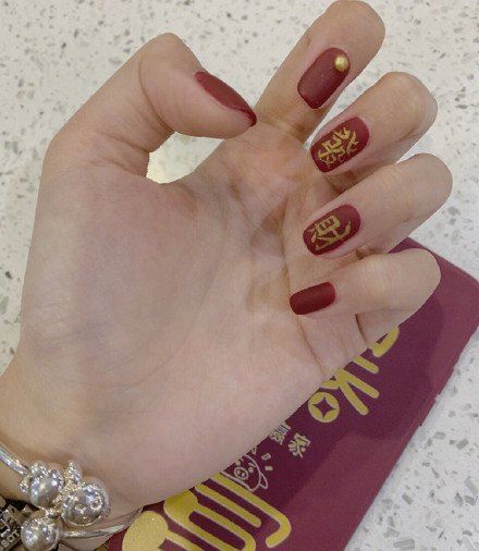 2022新年发财美甲图片大全 2022春节发财暴富美甲图片