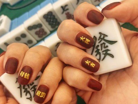 2022新年发财美甲图片大全 2022春节发财暴富美甲图片
