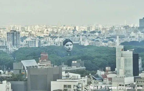 世界上最诡异的人头，日本高空惊现15米的悬空大叔头(是氢气球)